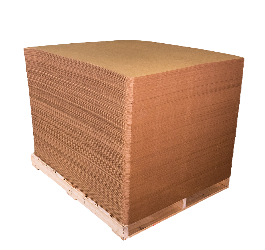 Stack of kraft brown paperboard slip sheets with pull-tab lip on warehouse floor for pallet-less push-pull forklift shipping